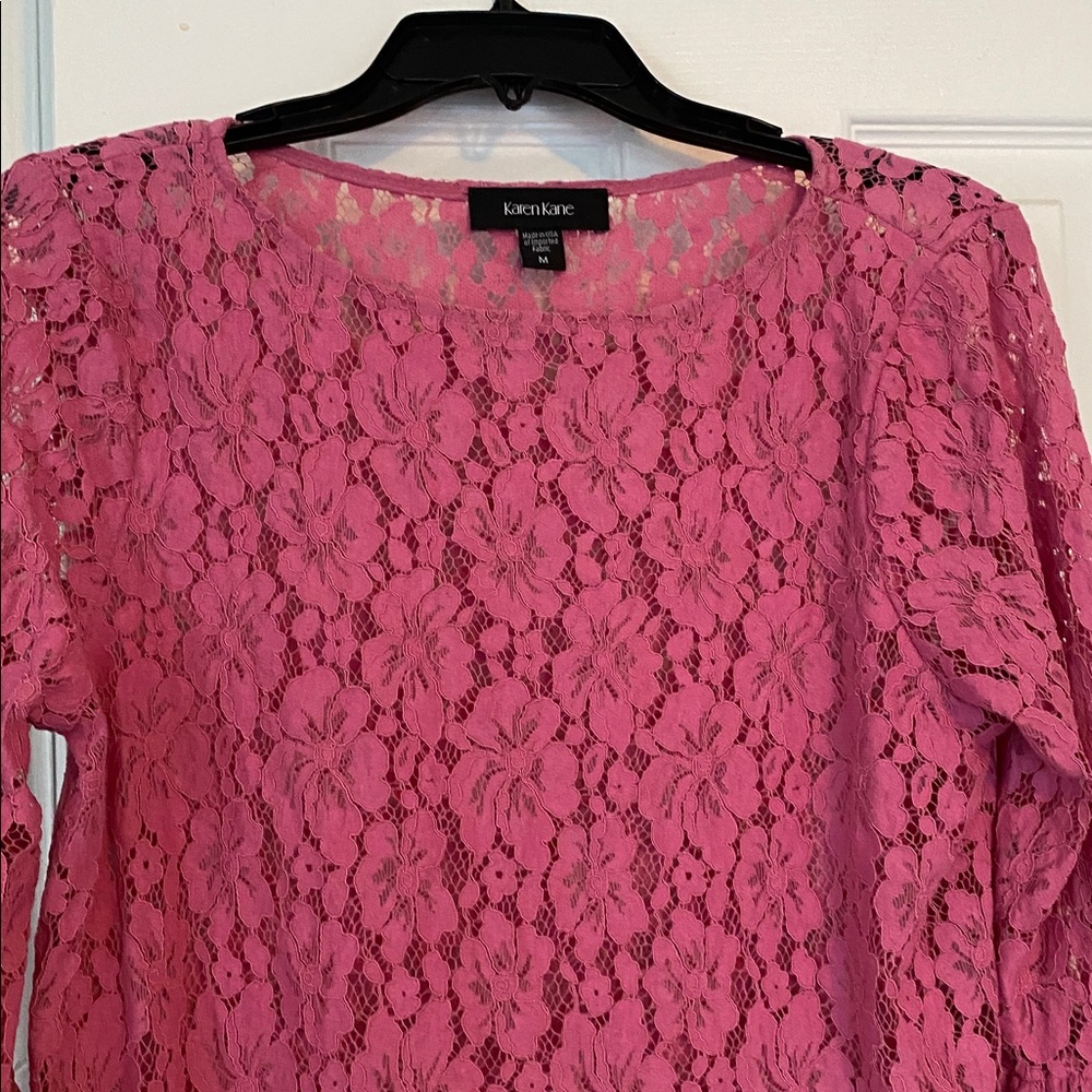Karen Kane Pink Lace Bell Sleeve Blouse. Size M in EC. No buttons, zippers.